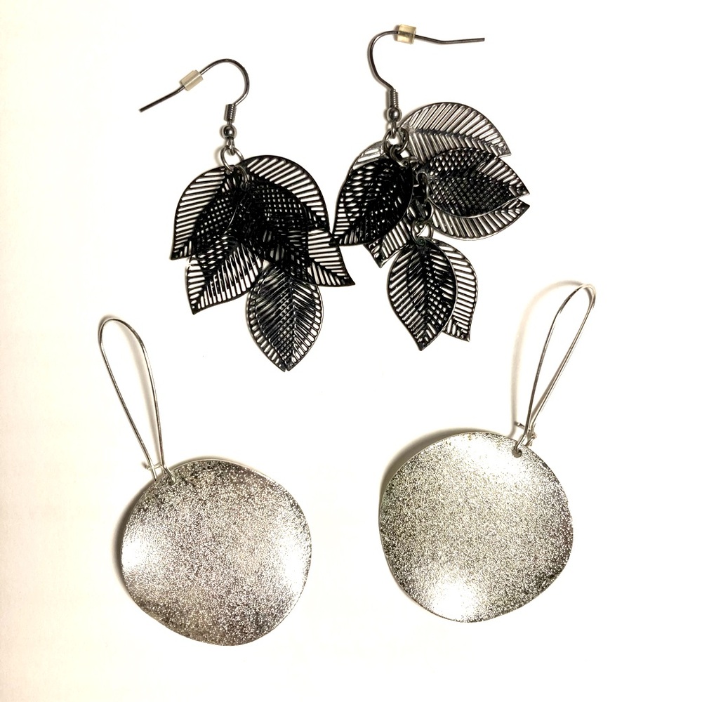 Lot of 2 earring sets 1-silver and 1-black.